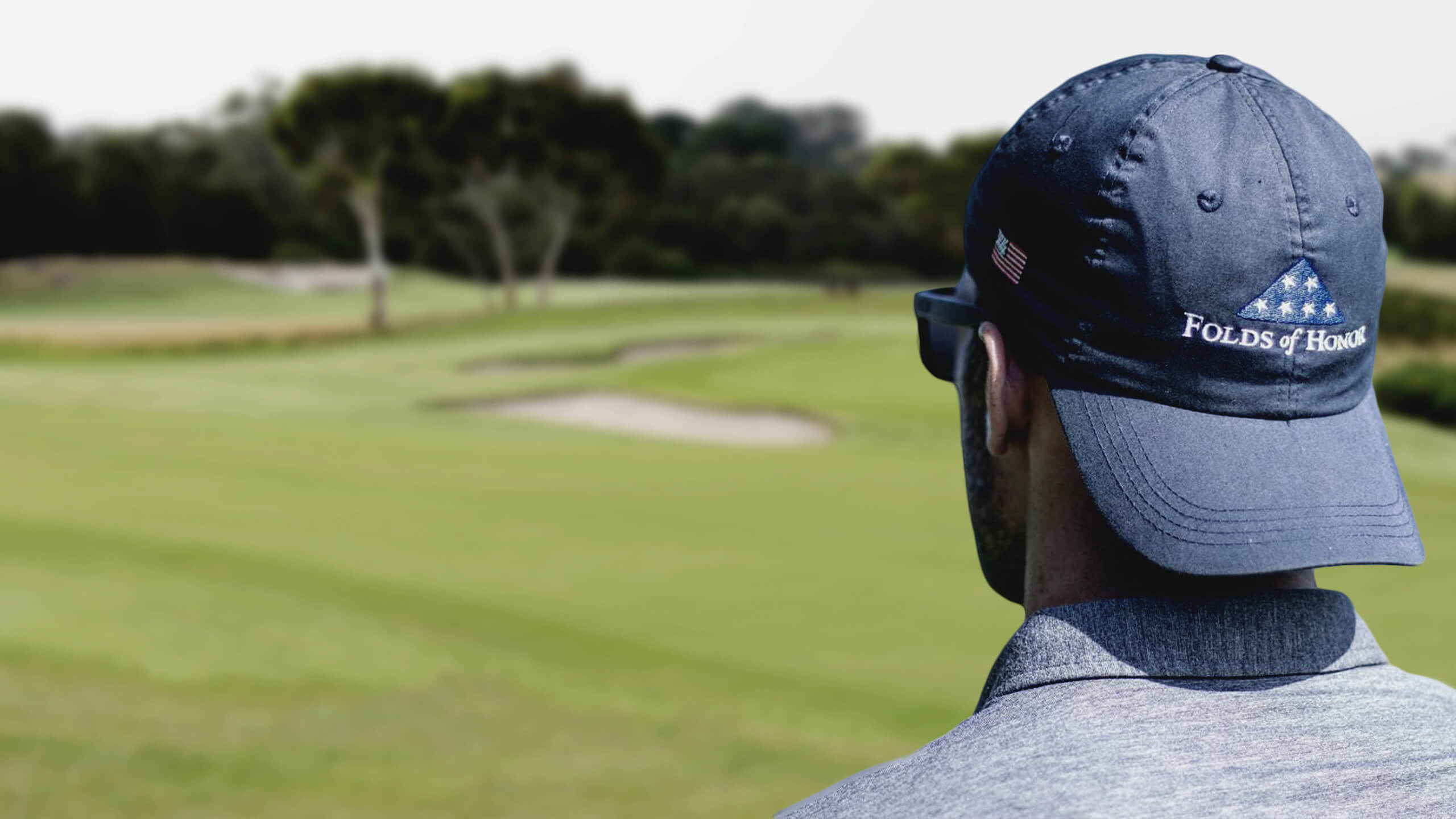 Folds of deals honor golf hat